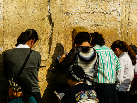 Jerusalem Israel April 16, 2018 Unknown woman praying front the Western Wall at the old city of Jerusalem on afternoonのeditorial素材