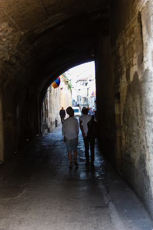 Jerusalem Israel April 16, 2018 Unknown people walking in the street of the Old city of Jerusalem on afternoonのeditorial素材