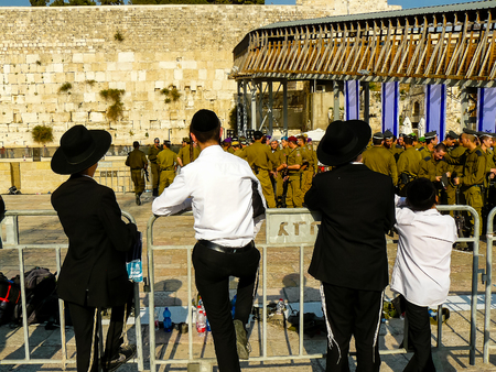 Jerusalem Israel April 16, 2018 Young kid looking a military ceremony on the Western Wall place in...