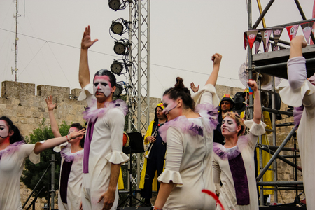 Jerusalem Israel May 10, 2018 The celebrations of the Middle Kingdom of the Golden Tooth Festival at the Old city of Jerusalem, The dance of unstoppable joy on the festival stage in the eveningのeditorial素材