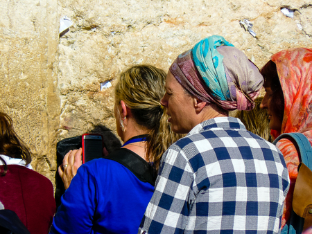 Jerusalem Israel May 14, 2018 Unknowns women praying front the Western wall in the old city of Jerusalem in the eveningのeditorial素材