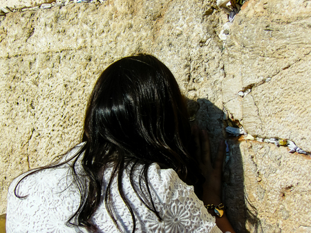 Jerusalem Israel May 14, 2018 Unknowns women praying front the Western wall in the old city of Jerusalem in the eveningのeditorial素材
