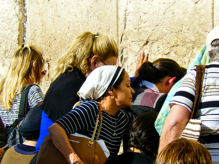 Jerusalem Israel May 14, 2018 Unknowns women praying front the Western wall in the old city of Jerusalem in the eveningのeditorial素材