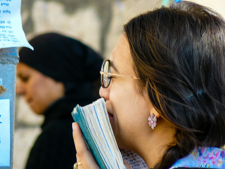 Jerusalem Israel May 14, 2018 Unknowns women praying front the Western wall in the old city of Jerusalem in the eveningのeditorial素材