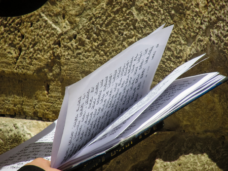 Jerusalem Israel May 21, 2018 View of an unknown religious Orthodox Jew praying in front of the western wall of the old city of Jerusalemのeditorial素材