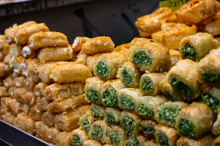 Jerusalem Israel May 24, 2018 Closeup of various pastries sold in the market of Jerusalem in Israel in the eveningの写真素材
