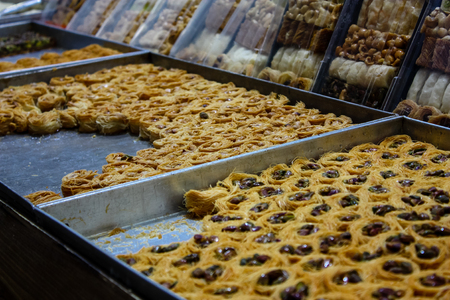 Jerusalem Israel May 24, 2018 Closeup of various pastries sold in the market of Jerusalem in Israel in the eveningのeditorial素材