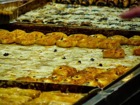Jerusalem Israel May 24, 2018 Closeup of various pastries sold in the market of Jerusalem in Israel in the eveningのeditorial素材