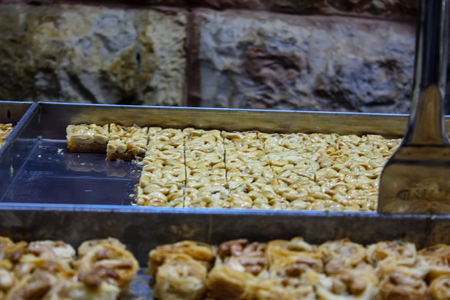 Jerusalem Israel May 24, 2018 Closeup of various pastries sold in the market of Jerusalem in Israel in the eveningのeditorial素材