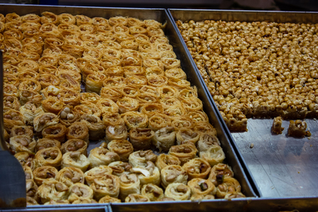Jerusalem Israel May 24, 2018 Closeup of various pastries sold in the market of Jerusalem in Israel in the eveningのeditorial素材