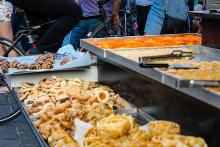 Jerusalem Israel May 24, 2018 Closeup of various pastries sold in the market of Jerusalem in Israel in the eveningのeditorial素材