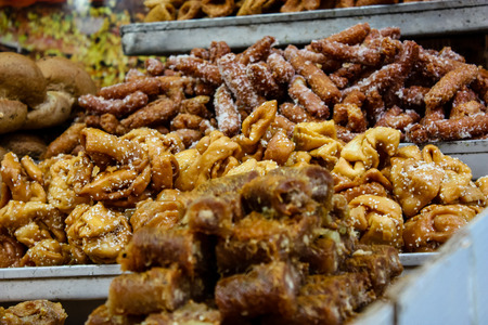 Jerusalem Israel May 24, 2018 Closeup of various pastries sold in the market of Jerusalem in Israel in the eveningのeditorial素材