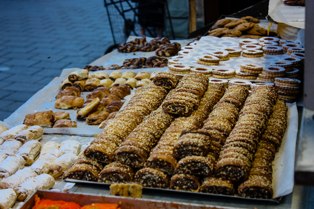 Jerusalem Israel May 24, 2018 Closeup of various pastries sold in the market of Jerusalem in Israel in the eveningのeditorial素材