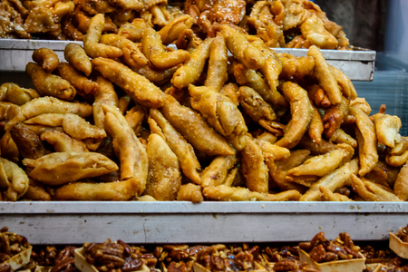 Jerusalem Israel May 24, 2018 Closeup of various pastries sold in the market of Jerusalem in Israel in the eveningのeditorial素材