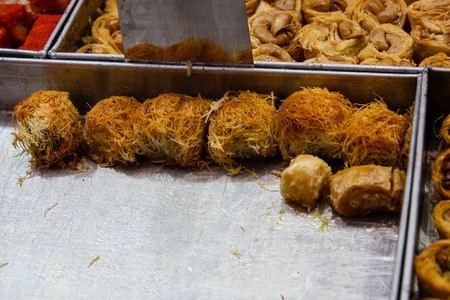 Jerusalem Israel May 24, 2018 Closeup of various pastries sold in the market of Jerusalem in Israel in the eveningのeditorial素材