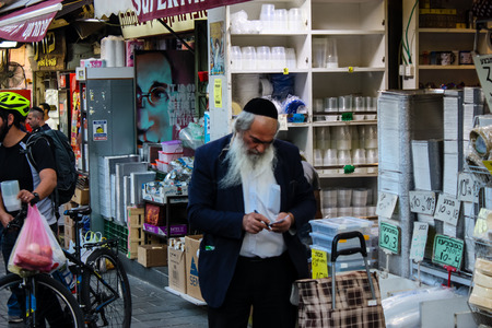 Jerusalem Israel May 24, 2018 Unknowns people walking and shopping at Mahane Yehuda market in Jerusalem afternoonのeditorial素材