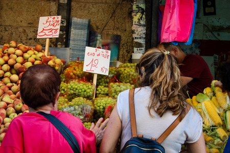 Jerusalem Israel May 24, 2018 Unknowns people walking and shopping at Mahane Yehuda market in Jerusalem afternoonのeditorial素材