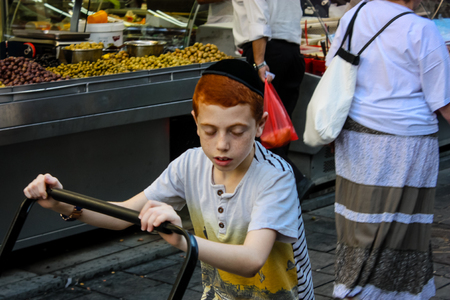 Jerusalem Israel May 24, 2018 Unknowns people walking and shopping at Mahane Yehuda market in Jerusalem afternoonのeditorial素材