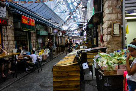 Jerusalem Israel May 24, 2018 Unknowns people walking and shopping at Mahane Yehuda market in Jerusalem afternoonのeditorial素材