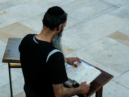 Jerusalem Israel May 17, 2018 Unknowns people praying front the Western Wall in the Old city of Jerusalem in the eveningのeditorial素材