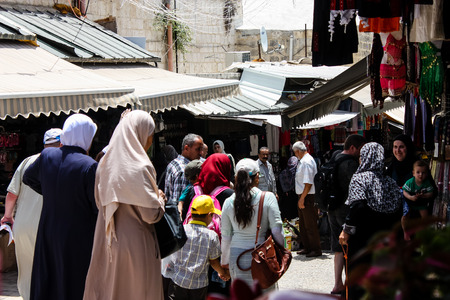 Jerusalem Israel May 28, 2018 View of unknowns people walking in David street in the muslim quarter at the Old city of Jerusalem in the morningのeditorial素材