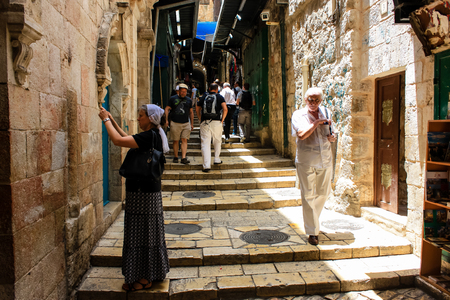Jerusalem Israel May 28, 2018 View of unknowns people walking in David street in the muslim quarter at the Old city of Jerusalem in the morningのeditorial素材