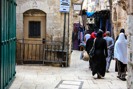 Jerusalem Israel May 28, 2018 View of unknowns people walking in David street in the muslim quarter at the Old city of Jerusalem in the morningのeditorial素材