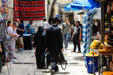 Jerusalem Israel May 28, 2018 View of unknowns people walking in David street in the muslim quarter at the Old city of Jerusalem in the morningのeditorial素材