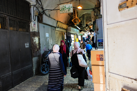 Jerusalem Israel May 28, 2018 View of unknowns people walking in David street in the muslim quarter at the Old city of Jerusalem in the morningのeditorial素材