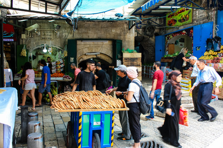 Jerusalem Israel May 28, 2018 View of unknowns people walking in David street in the muslim quarter at the Old city of Jerusalem in the morningのeditorial素材