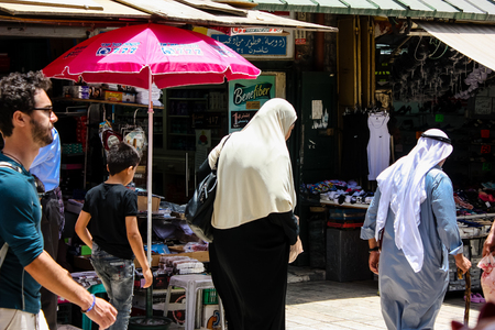 Jerusalem Israel May 28, 2018 View of unknowns people walking in David street in the muslim quarter at the Old city of Jerusalem in the morningのeditorial素材