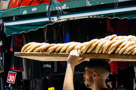 Jerusalem Israel May 28, 2018 View of unknowns people walking in David street in the muslim quarter at the Old city of Jerusalem in the morningのeditorial素材