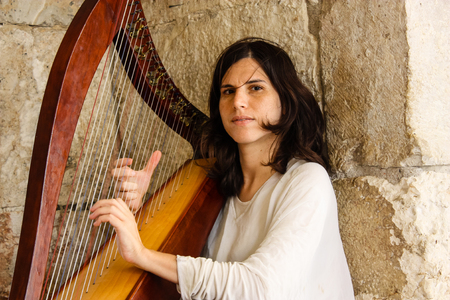 Jerusalem Israel May 28, 2018 View of a street musician playing Harp at the Jaffa Gate in the Old...
