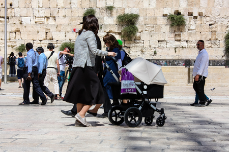 Jerusalem Israel May 21, 2018 View of unknowns people walking on the Western wall plaza in the old city of Jerusalem in the eveningのeditorial素材