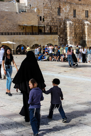 Jerusalem Israel May 21, 2018 View of unknowns people walking on the Western wall plaza in the old city of Jerusalem in the eveningのeditorial素材