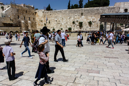 Jerusalem Israel May 21, 2018 View of unknowns people walking on the Western wall plaza in the old city of Jerusalem in the eveningのeditorial素材