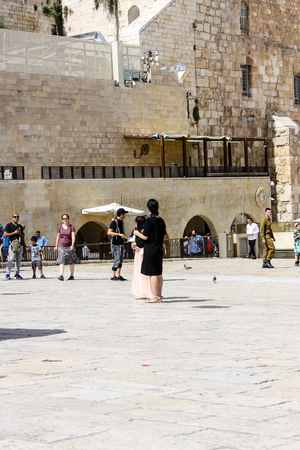 Jerusalem Israel May 21, 2018 View of unknowns people walking on the Western wall plaza in the old city of Jerusalem in the eveningのeditorial素材