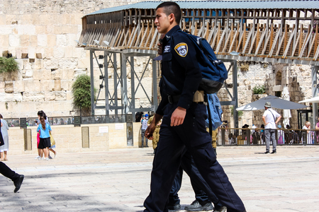 Jerusalem Israel May 21, 2018 View of unknown Israeli police officer walking on the Western wall...