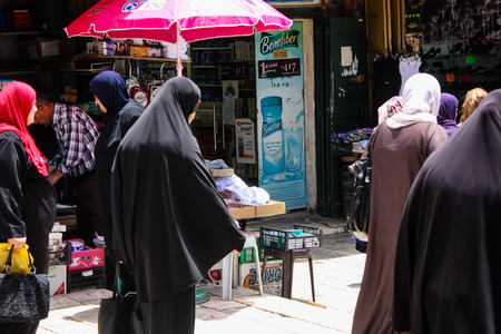 Jerusalem Israel May 28, 2018 View of unknowns people walking in David street in the muslim quarter at the Old city of Jerusalem in the morningのeditorial素材