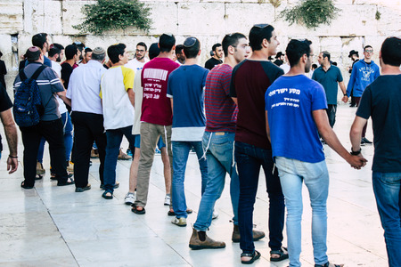 Jerusalem Israel May 31, 2018 View of unknowns people dancing and singing front the Western Wall in the old city of Jerusalem in the eveningのeditorial素材