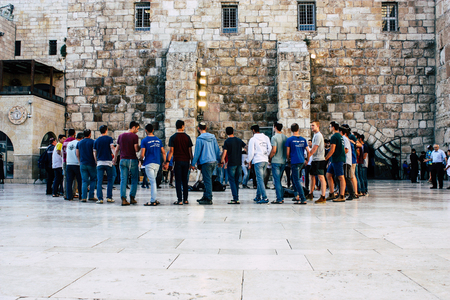 Jerusalem Israel May 31, 2018 View of unknowns people dancing and singing front the Western Wall in the old city of Jerusalem in the eveningのeditorial素材