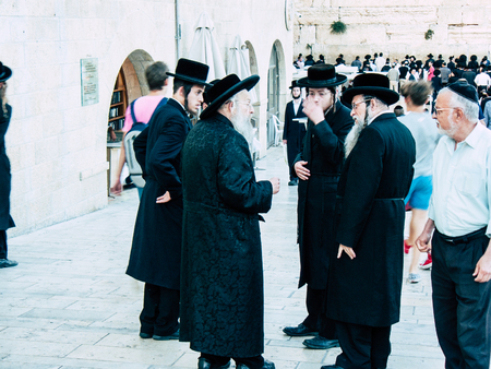 Jerusalem Israel April 14, 2018 Unknowns people praying front the Western Wall at the old city of Jerusalem on afternoonのeditorial素材