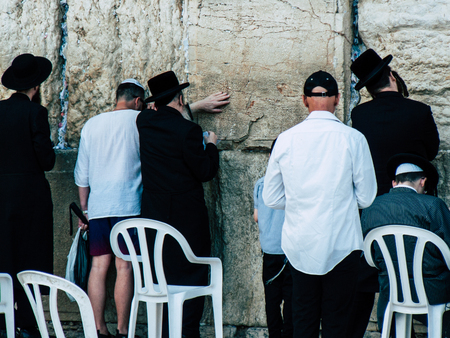 Jerusalem Israel April 14, 2018 Unknowns people praying front the Western Wall at the old city of Jerusalem on afternoonのeditorial素材
