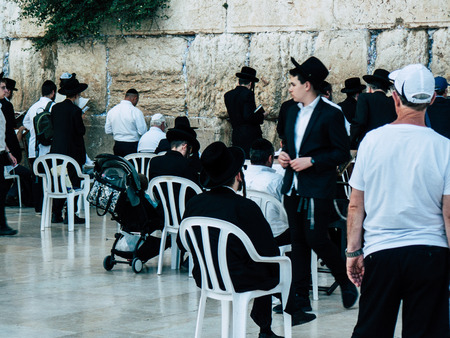 Jerusalem Israel April 14, 2018 Unknowns people praying front the Western Wall at the old city of Jerusalem on afternoonのeditorial素材