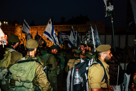 Jerusalem Israel June 07, 2018 View of soldiers attending an army ceremony on the Western Wall Square in the old city of Jerusalem in the eveningのeditorial素材