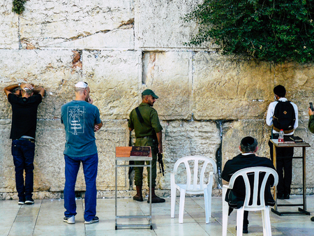 Jerusalem Israel June 07, 2018 View of unknowns people praying front the Western Wall in the old city of Jerusalem in the eveningのeditorial素材