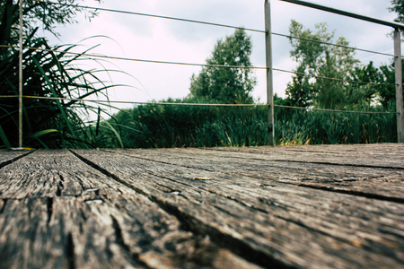 View of a wood bridge from the ground level near Reims in Franceの写真素材