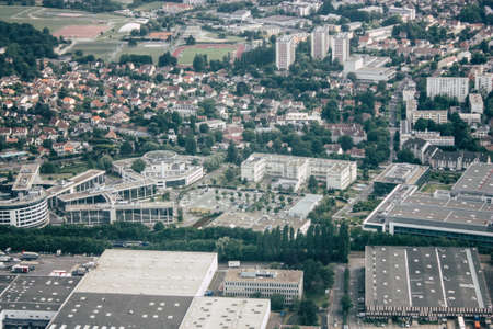 France June 29, 2018 Aerial view of buildings near Paris in France at 10,000 feet altitude in the afternoonのeditorial素材