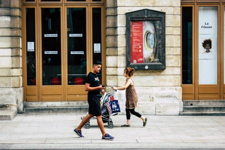 Reims France July 23, 2018 View of unknowns people walking in the street of Reims in the afternoonのeditorial素材