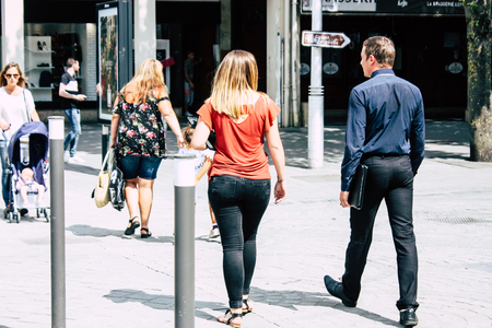 Reims France July 23, 2018 View of unknowns people walking in the street of Reims in the afternoonのeditorial素材
